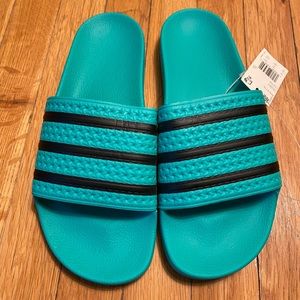Adidas Men’s Adilette slides in turquoise